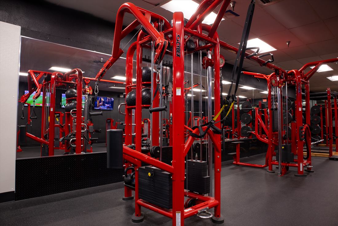 Cable stations on the Strength Station gym floor