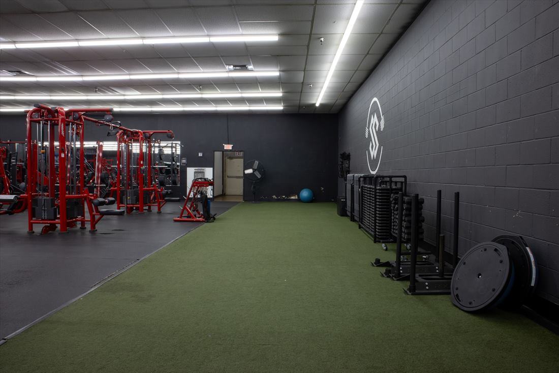 Functional training area with equipment storage